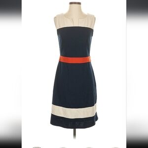 Elegant Navy and Cream Dress with Orange Accent